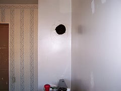 Repairing Large Holes in the Wall