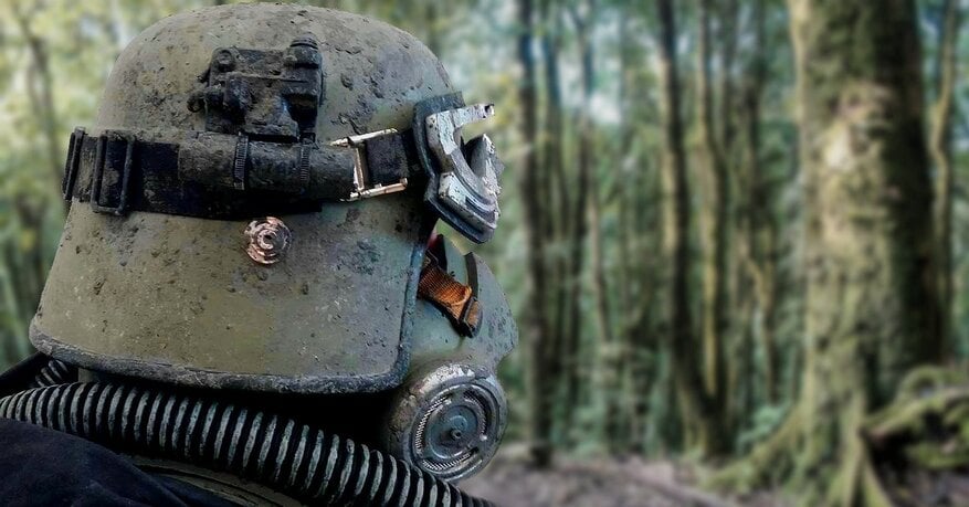 Mudtrooper in the jungle with a muddy helmet